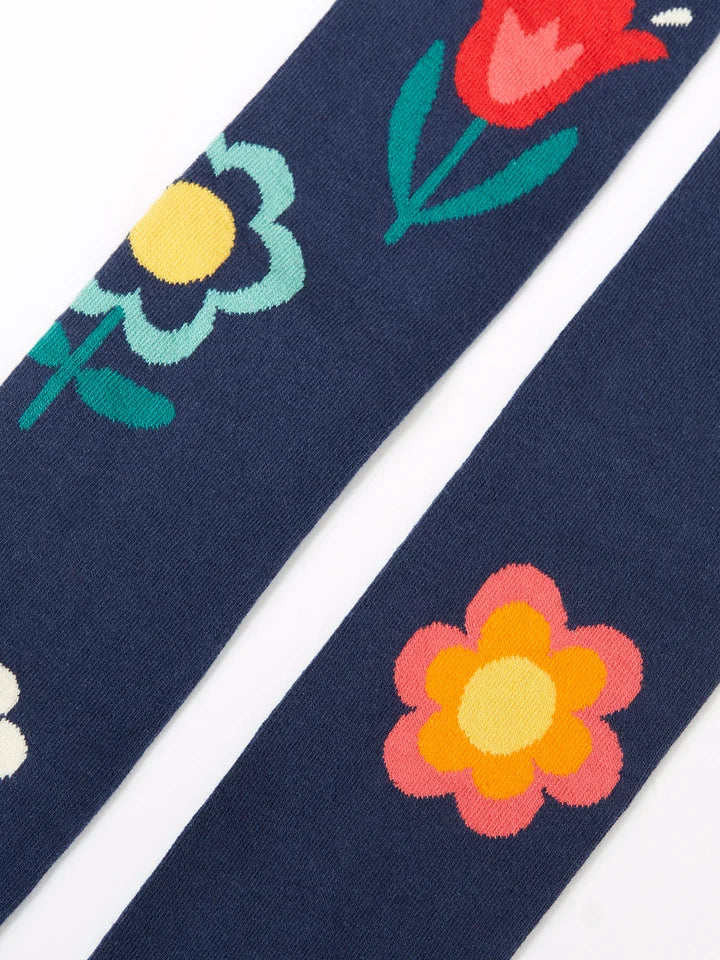 Strumpbyxor marinblå stora blommor