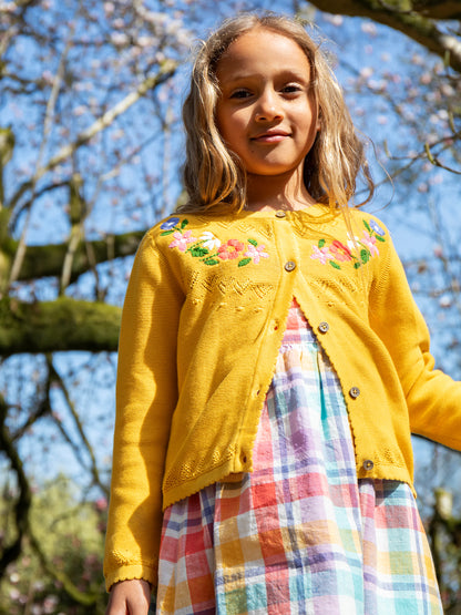 Kofta blommor och hålmönster