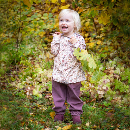 Långärmad topp rosablommig