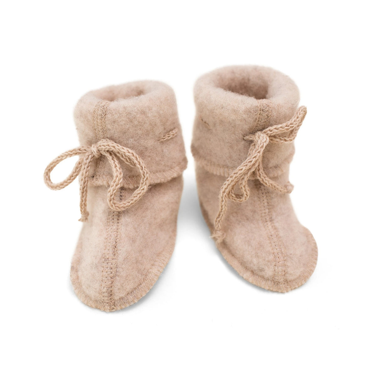 Babytossor i ekologisk ullfleece från Engel, sand