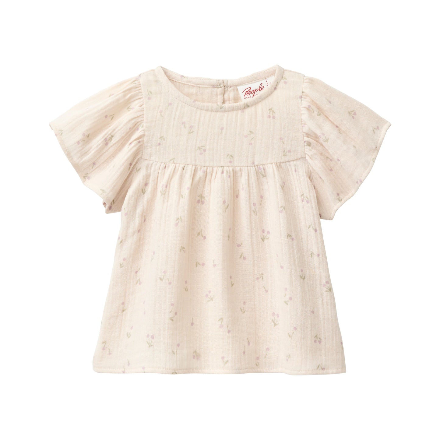 Babytopp i ekologisk bomullsmuslin från People Wear Organic med körsbärsmönster